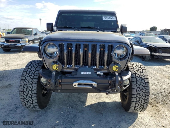 2022 Jeep Wrangler Unlimited Sahara with VIN 1C4HJXEN1NW187573, listed as a Copart auction lot 50950025 with 67,448 mi miles and Salvage Title. Bid and sale history available at carsss.com. Image 5.