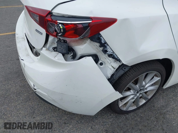 2017 Mazda 3 Touring with VIN 3MZBN1V72HM121902, listed as a IAAI auction lot 39193644 with 40,113 mi miles and . Bid and sale history available at DreamBid. Image 16.