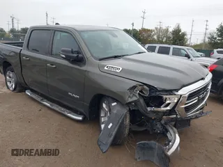 2021 Ram 1500 Lone Star with VIN 1C6RREFT9MN690570, listed as a IAAI auction lot 41020873 with 58,660 mi miles and . Bid and sale history available at DreamBid. Image 1.