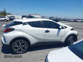 2019 Toyota C-HR XLE z VIN JTNKHMBX2K1049065, wystawiony jako IAAI lot #42226727 z przebiegiem 63 818 mil mil oraz . Historia ofert i sprzedaży dostępna na DreamBid. Obrazek 14.