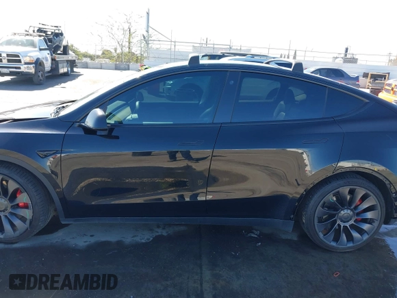 2021 Tesla Model Y Performance with VIN 5YJYGDEF9MF251738, listed as a IAAI auction lot 41708950 with 61,248 mi miles and . Bid and sale history available at DreamBid. Image 15.