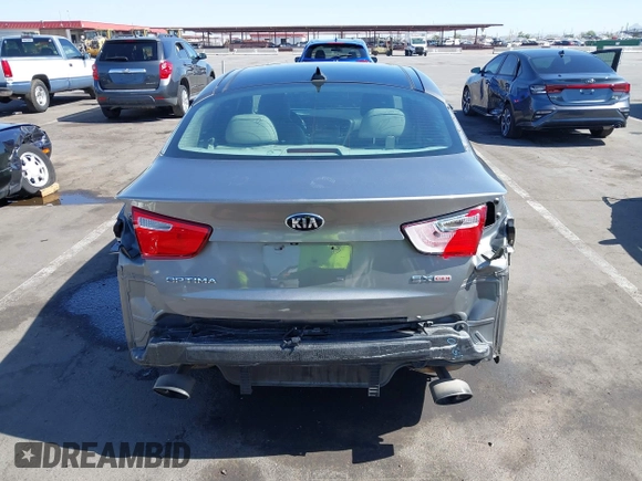 2014 Kia Optima EX z VIN 5XXGN4A72EG339786, wystawiony jako IAAI lot #42328516 z przebiegiem 103 035 mil mil oraz . Historia ofert i sprzedaży dostępna na DreamBid. Obrazek 17.