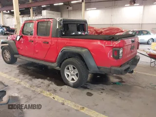 2020 Jeep Gladiator Sport S z VIN 1C6HJTAGXLL125496, wystawiony jako IAAI lot #41749633 z przebiegiem 56 203 mil mil oraz . Historia ofert i sprzedaży dostępna na DreamBid. Obrazek 3.
