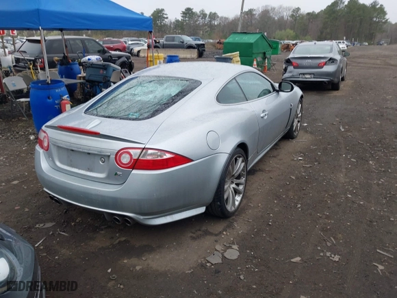 2008 Jaguar XK with VIN SAJWA43C889B21570, listed as a IAAI auction lot 42082547 with 99,783 mi miles. Bid and sale history available at carsss.com. Image 4.