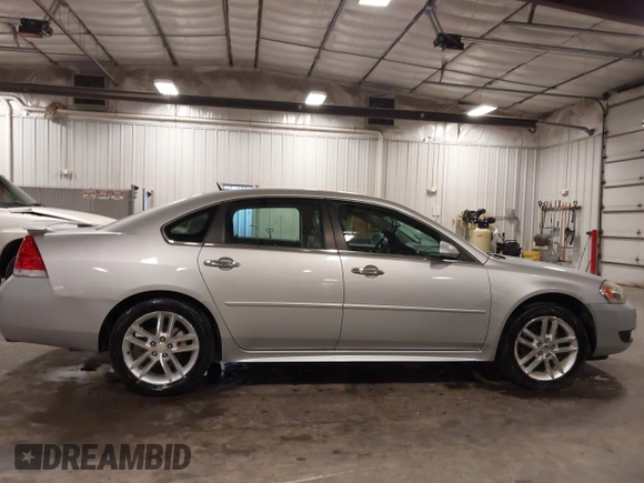 2014 Chevrolet Impala LTZ with VIN 2G1WC5E3XE1157931, listed as a IAAI auction lot 42688907 with 119,985 mi miles and . Bid and sale history available at DreamBid. Image 13.