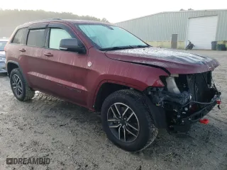 2019 Jeep Grand Cherokee Trailhawk with VIN 1C4RJFLTXKC718606, listed as a Copart auction lot 72661234 with 70,169 mi miles and Salvage Title. Bid and sale history available at carsss.com. Image 4.