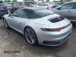 2020 Porsche 911 Carrera S with VIN WP0CB2A97LS262106, listed as a IAAI auction lot 42011151 with 63,444 mi miles. Bid and sale history available at carsss.com. Image 3.