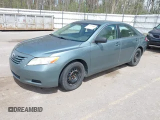 2009 Toyota Camry with VIN 4T1BE46K89U909468, listed as a IAAI auction lot 42159504 with 156,457 mi miles. Bid and sale history available at carsss.com. Image 2.