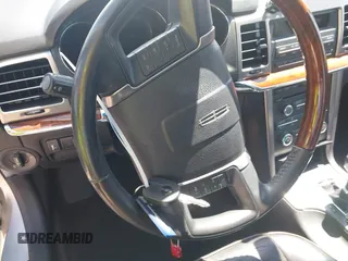 2012 Lincoln MKZ with VIN 3LNHL2GC0CR801954, listed as a IAAI auction lot 42214083 with 107,510 mi miles and . Bid and sale history available at DreamBid. Image 11.