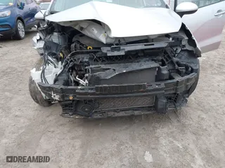 2014 Kia Rio LX with VIN KNADM5A34E6338174, listed as a IAAI auction lot 42039451 with 87,528 mi miles. Bid and sale history available at carsss.com. Image 6.