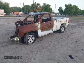 2014 Chevrolet Silverado 1500 with VIN 1GCNCREH7EZ137584, listed as a IAAI auction lot 41925804 with Not Provided miles and . Bid and sale history available at DreamBid. Image 2.