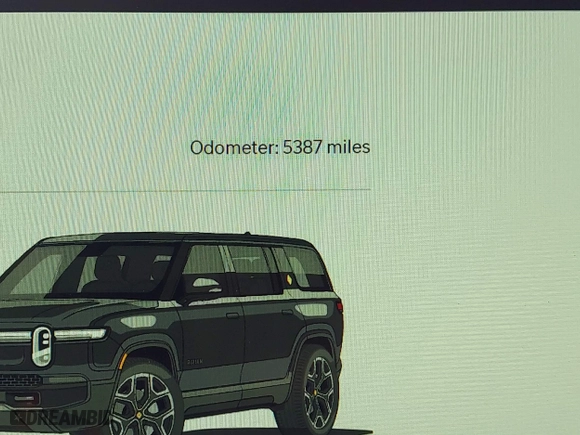 2025 Rivian R1S Adventure with VIN 7PDSGBBA5SN055497, listed as a IAAI auction lot 41695600 with 5,387 mi miles. Bid and sale history available at carsss.com. Image 16.