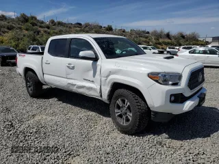 2019 Toyota Tacoma SR z VIN 3TMCZ5AN1KM263494, wystawiony jako Copart lot #54710695 z przebiegiem 57 216 mil mil oraz Szkoda całkowita • Salvage title. Historia ofert i sprzedaży dostępna na DreamBid. Obrazek 4.