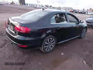 2013 Volkswagen Jetta Hybrid SEL with VIN 3VW637AJ1DM277984, listed as a IAAI auction lot 41450384 with 117,665 mi miles and . Bid and sale history available at DreamBid. Image 4.