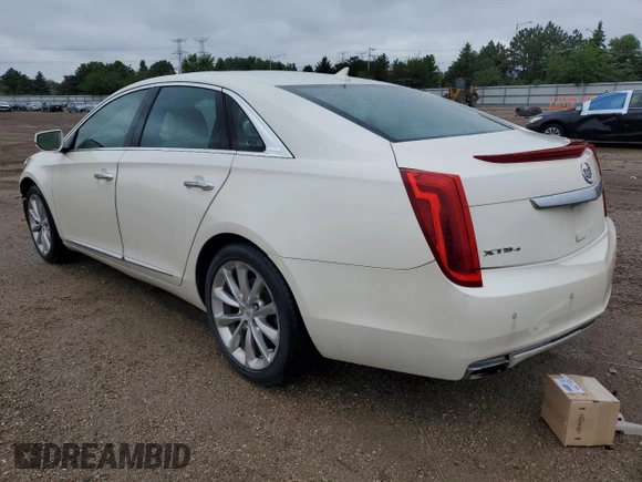 2013 Cadillac XTS Luxury with VIN 2G61R5S38D9158888, listed as a Copart auction lot 57568365 with 92,529 mi miles and Salvage title. Bid and sale history available at DreamBid. Image 2.