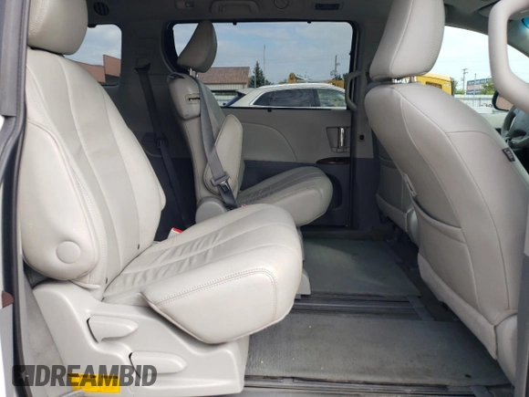 2012 Toyota Sienna XLE AAS with VIN 5TDYK3DC0CS250830, listed as a Copart auction lot 73323284 with 147,580 mi miles and Salvage Title. Bid and sale history available at DreamBid. Image 11.
