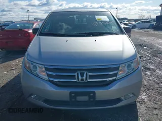 2011 Honda Odyssey Touring with VIN 5FNRL5H92BB049901, listed as a IAAI auction lot 41985224 with 101,957 mi miles and . Bid and sale history available at DreamBid. Image 12.