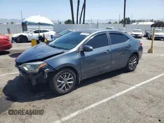 2014 Toyota Corolla L with VIN 5YFBURHE5EP014071, listed as a Copart auction lot 61442695 with 140,944 mi miles and Salvage title. Bid and sale history available at DreamBid. Image 1.