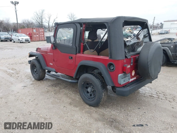 1999 Jeep Wrangler SE with VIN 1J4FY29P6XP408738, listed as a IAAI auction lot 41716999 with 124,692 mi miles. Bid and sale history available at carsss.com. Image 3.