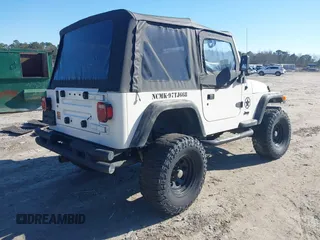 1997 Jeep Wrangler Sport with VIN 1J4FY19S7VP483735, listed as a IAAI auction lot 41469983 with 150,542 mi miles. Bid and sale history available at carsss.com. Image 4.