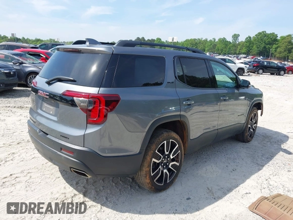 2021 GMC Acadia SLE with VIN 1GKKNRLS3MZ147270, listed as a IAAI auction lot 42211633 with 94,884 mi miles and . Bid and sale history available at DreamBid. Image 4.