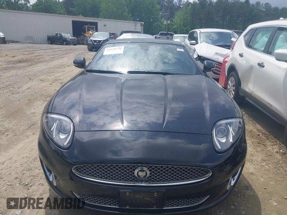 2012 Jaguar XK with VIN SAJWA4FB8CLB47049, listed as a IAAI auction lot 42118136 with 60,953 mi miles. Bid and sale history available at carsss.com. Image 12.