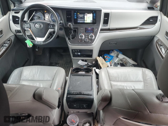 2017 Toyota Sienna with VIN 5TDDZ3DC9HS161212, listed as a Copart auction lot 50129845 with 104,020 mi miles and Salvage Title. Bid and sale history available at DreamBid. Image 8.
