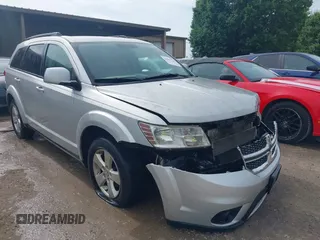 2012 Dodge Journey SXT z VIN 3C4PDDBG6CT136189, wystawiony jako IAAI lot #42261514 z przebiegiem 170 290 mil mil oraz . Historia ofert i sprzedaży dostępna na DreamBid. Obrazek 1.