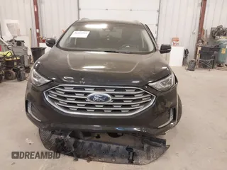 2020 Ford Edge SEL z VIN 2FMPK4J95LBA90533, wystawiony jako IAAI lot #42151916 z przebiegiem 57 197 mil mil oraz . Historia ofert i sprzedaży dostępna na DreamBid. Obrazek 6.