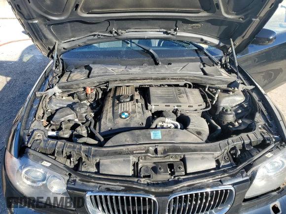 2010 BMW 1 Series 135i with VIN WBAUN9C52AVK41235, listed as a Copart auction lot 85384434 with 84,636 mi miles and Salvage title. Bid and sale history available at DreamBid. Image 11.