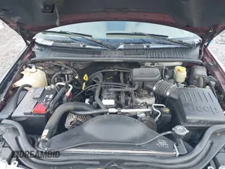 2000 Jeep Grand Cherokee Laredo with VIN 1J4G248S0YC351033, listed as a IAAI auction lot 42165830 with 145,351 mi miles and . Bid and sale history available at DreamBid. Image 10.