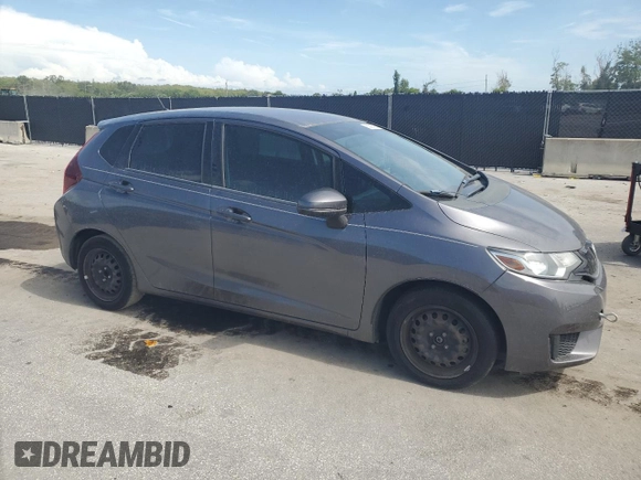 2015 Honda Fit LX with VIN 3HGGK5H56FM717242, listed as a Copart auction lot 62993835 with 155,310 mi miles and Clean title. Bid and sale history available at DreamBid. Image 4.