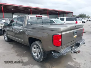 2015 Chevrolet Silverado 1500 LTZ with VIN 3GCPCSEC6FG408754, listed as a IAAI auction lot 41514369 with 140,928 mi miles and . Bid and sale history available at DreamBid. Image 3.