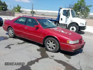 1996 Cadillac Seville Touring STS with VIN 1G6KY5290TU835414, listed as a IAAI auction lot 42051767 with 185,798 mi miles. Bid and sale history available at carsss.com. Image 1.