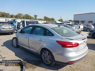 2017 Ford Focus Titanium with VIN 1FADP3J25HL268315, listed as a IAAI auction lot 41606289 with Not provided miles and . Bid and sale history available at DreamBid. Image 3.