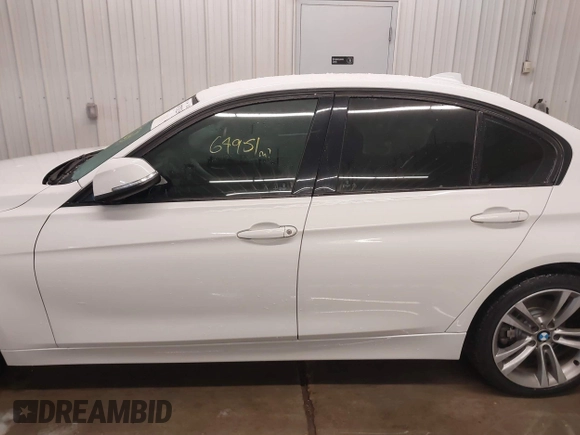 2016 BMW 3 Series 328i with VIN WBA8E9G5XGNT85247, listed as a IAAI auction lot 41578238 with 64,951 mi miles. Bid and sale history available at carsss.com. Image 14.