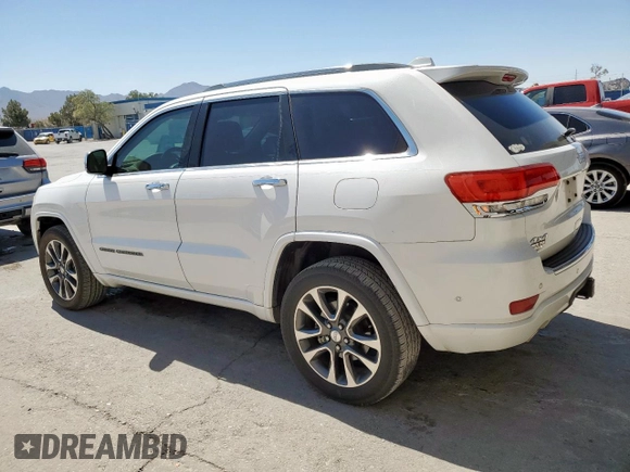 2017 Jeep Grand Cherokee Overland z VIN 1C4RJFCT5HC612721, wystawiony jako Copart lot #57652865 z przebiegiem 103 690 mil mil oraz Tytuł czysty. Historia ofert i sprzedaży dostępna na DreamBid. Obrazek 2.
