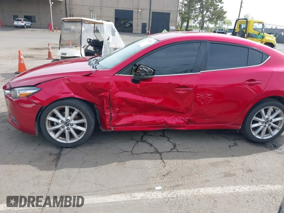2017 Mazda 3 Touring with VIN 3MZBN1V79HM129043, listed as a IAAI auction lot 41970009 with 142,654 mi miles and . Bid and sale history available at DreamBid. Image 6.
