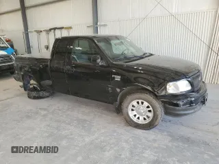 2002 Ford F-150 XL with VIN 2FTRX07W72CA71544, listed as a Copart auction lot 81628694 with 313,663 mi miles and Salvage title. Bid and sale history available at DreamBid. Image 4.