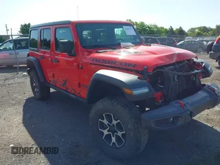 2021 Jeep Wrangler Unlimited Rubicon z VIN 1C4HJXFG2MW575541, wystawiony jako IAAI lot #42247475 z przebiegiem 92 353 mil mil oraz . Historia ofert i sprzedaży dostępna na DreamBid. Obrazek 1.