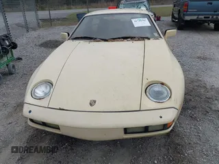 1982 Porsche 928 z VIN WP0JA0921CS820795, wystawiony jako IAAI lot #41741787 z przebiegiem 121 568 mil mil oraz . Historia ofert i sprzedaży dostępna na DreamBid. Obrazek 6.