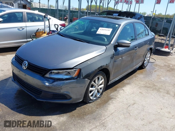 2011 Volkswagen Jetta Sedan SE PZEV with VIN 3VWDZ7AJ0BM306023, listed as a IAAI auction lot 42059241 with 176,879 mi miles. Bid and sale history available at carsss.com. Image 2.