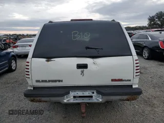 1995 GMC Suburban z VIN 1GKFK16K3SJ704911, wystawiony jako Copart lot #88326825 z przebiegiem 191 006 mil mil oraz Szkoda całkowita • Salvage title. Historia ofert i sprzedaży dostępna na DreamBid. Obrazek 6.