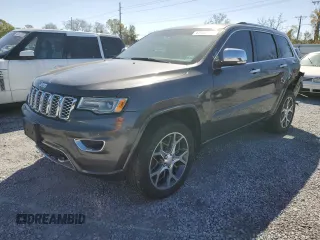 2021 Jeep Grand Cherokee Overland with VIN 1C4RJFCG0MC728129, listed as a Copart auction lot 47450465 with 28,287 mi miles and Salvage title. Bid and sale history available at DreamBid. Image 1.