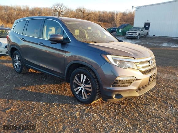 2017 Honda Pilot EX-L with VIN 5FNYF5H56HB020703, listed as a IAAI auction lot 41366342 with 96,618 mi miles. Bid and sale history available at carsss.com. Image 1.