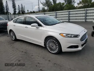 2016 Ford Fusion Titanium with VIN 3FA6P0K92GR369444, listed as a Copart auction lot 89036195 with 253,715 mi miles and Clean Title. Bid and sale history available at DreamBid. Image 4.
