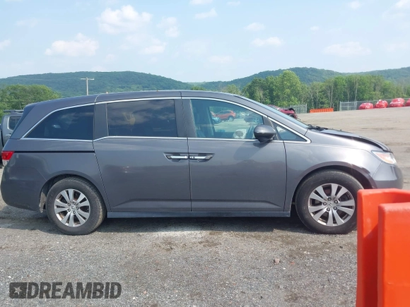 2014 Honda Odyssey EX-L with VIN 5FNRL5H6XEB121390, listed as a IAAI auction lot 42480217 with 291,766 mi miles and . Bid and sale history available at DreamBid. Image 13.