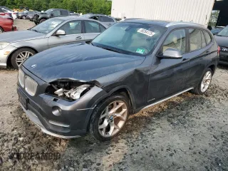 2015 BMW X1 xDrive28i z VIN WBAVL1C51FVY29839, wystawiony jako Copart lot #59284175 z przebiegiem 158 308 mil mil oraz Szkoda całkowita • Salvage title. Historia ofert i sprzedaży dostępna na DreamBid. Obrazek 1.