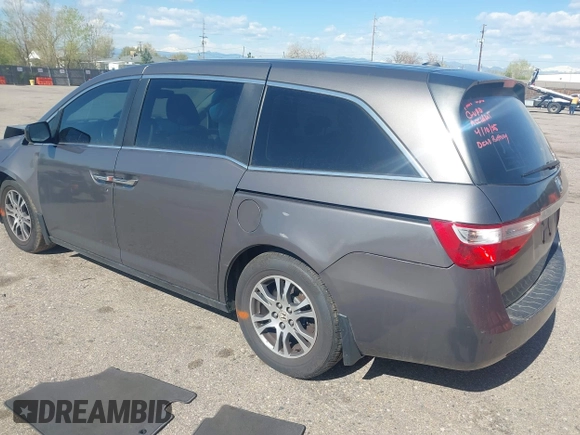 2012 Honda Odyssey EX-L with VIN 5FNRL5H61CB095789, listed as a IAAI auction lot 42065507 with 138,570 mi miles and . Bid and sale history available at DreamBid. Image 3.