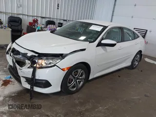2017 Honda Civic LX with VIN 19XFC2F5XHE007668, listed as a IAAI auction lot 42219927 with 132,444 mi miles and . Bid and sale history available at DreamBid. Image 2.